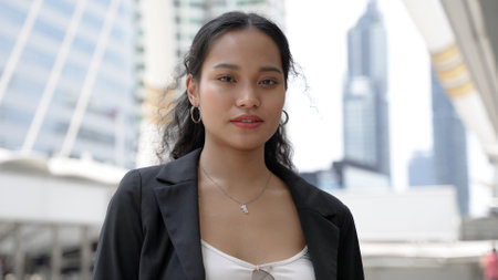 Young Thai Businesswoman in an Urban Districtの写真素材