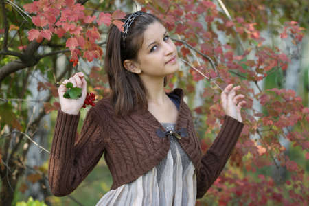  Girl in the autumn forestの写真素材