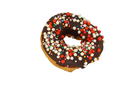 The donut decorated with chocolate and multicolored beadsの写真素材