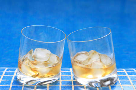 Whiskey near the poolの写真素材