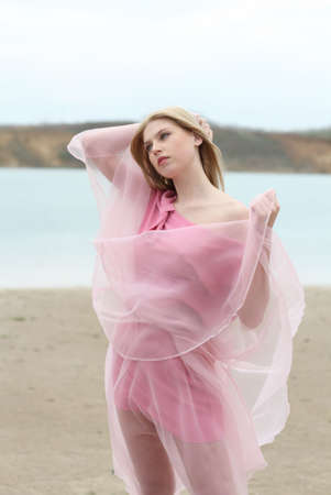 Beautiful romantic girl on the beachの写真素材