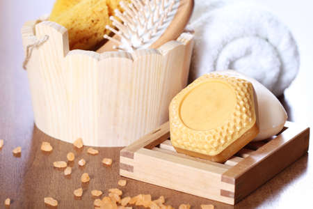 Bath basket and accessories: bath sponge, soap, towel, saltの写真素材
