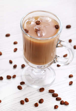 Ice coffee on the white wooden backgroundの写真素材