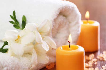 Spa setting with freesia, towel, burning candles and salt
の写真素材