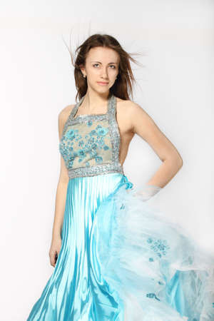 Romantic girl in the beautiful dress in studioの写真素材