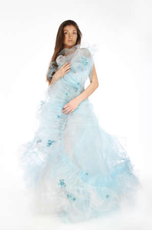 Romantic girl in the beautiful dress in studioの写真素材