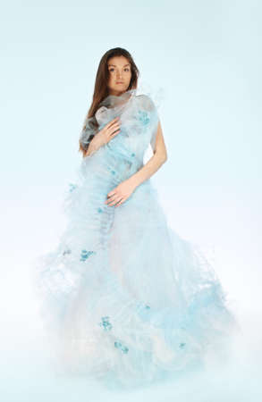 Romantic girl in the beautiful dress in studioの写真素材