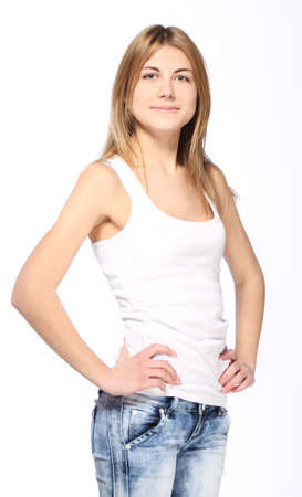 Portrait of young beautiful blond girl in blue jeansの写真素材