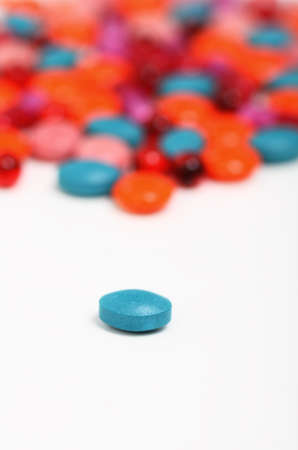 Multicolor pills and capsules on white backgroundの写真素材