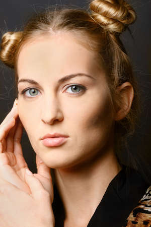 Close up portrait of the blond girl with green eyesの写真素材