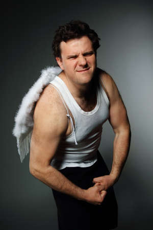 Mr. Angel with white wings. Crazy character portrait.の写真素材