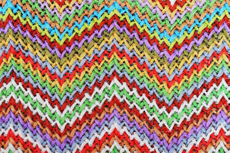 Bright multicolor geometric abstract background textile. Close upの写真素材