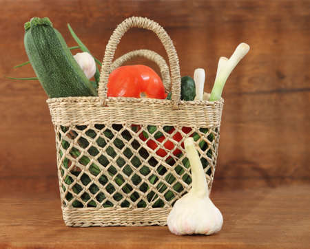 Still life with basket of the fresh vegetables の写真素材