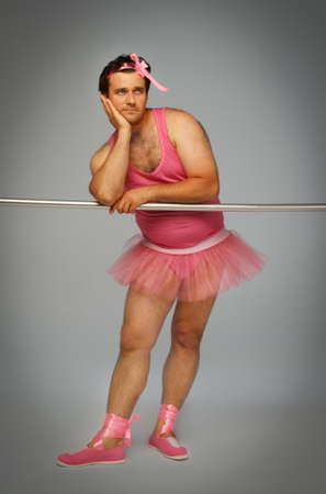 Crazy ballerina. Man wearing ballerina suit in pink colorの写真素材