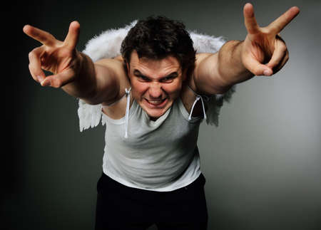 Mr. Angel with white wings. Crazy character portraitの写真素材