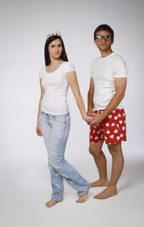 Portrait of a young crazy couple in studioの写真素材