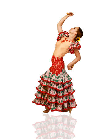 Young woman dancing flamenco on white backgroundの写真素材