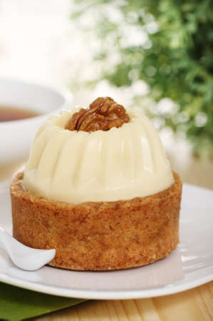 Walnut cake decorated with a cream with coffeeの写真素材