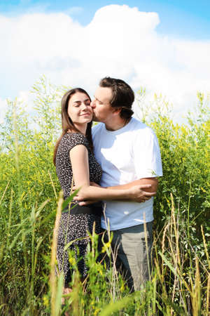 Couple in love in the summer fieldの写真素材