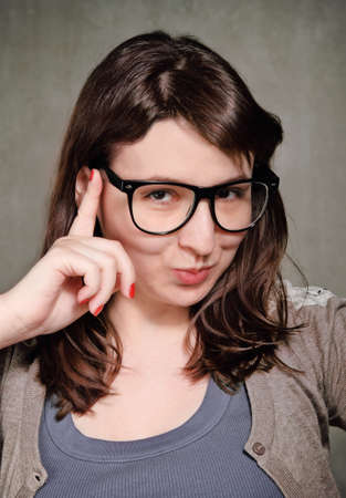 Funny young brunette woman in retro styleの写真素材