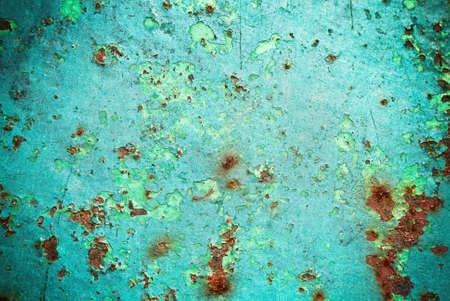 Colored pieces of old paint. Fragment of the old wallの写真素材