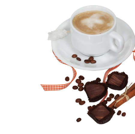 White cup of coffee, chocolate, sugar and cinnamon の写真素材