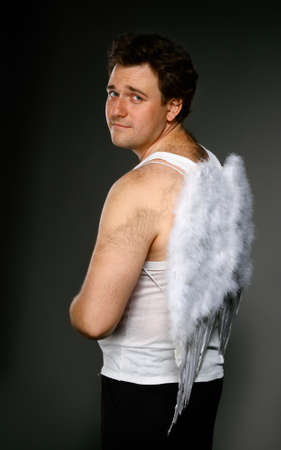Mr. Angel with white wings. Crazy character portraitの写真素材