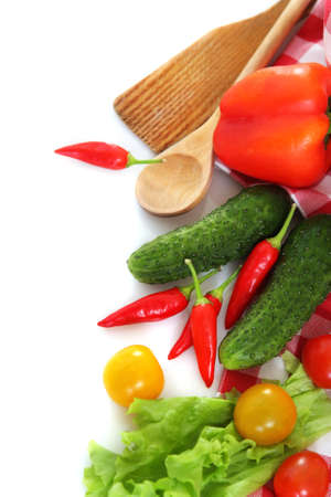Vegetables still life with kitchen tools over white backgroundの写真素材