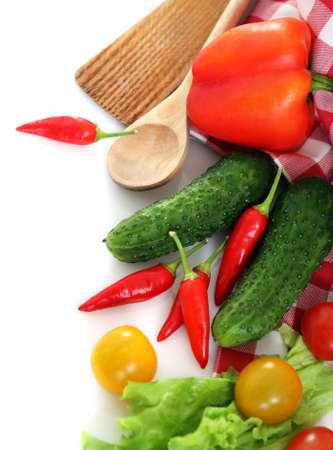 Vegetables still life with kitchen tools over white backgroundの写真素材