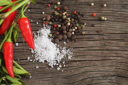 Spices over wooden background with copyspaceの写真素材