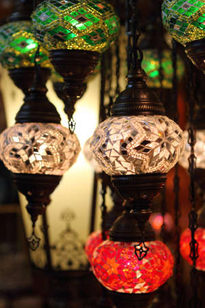 Traditional vintage Turkish lamps over light background in the night