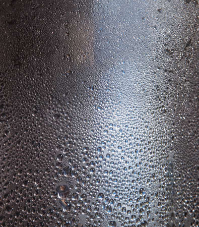 Water drops on a metallic background. Close upの写真素材