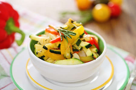 Ratatouille on white plate closeup on the tableの写真素材