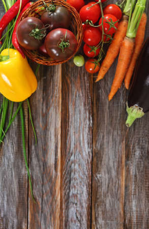 Vegetables still life in wooden background with copy spaceの写真素材