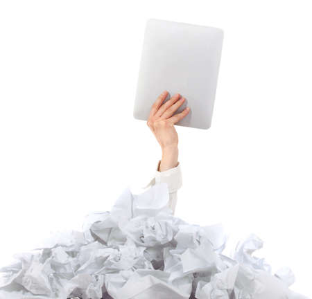 Two many paper work. Hands of woman holding her tablet computer over papersの写真素材
