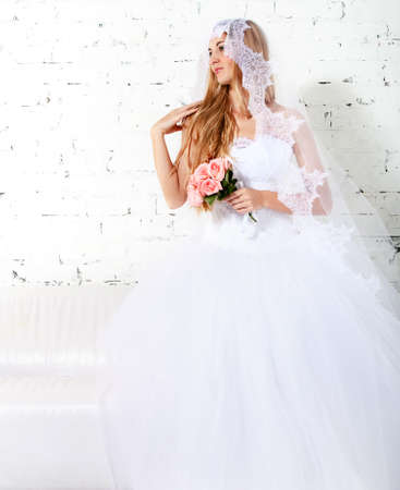 Portrait of a beautiful blond bride. Studio portraitの写真素材