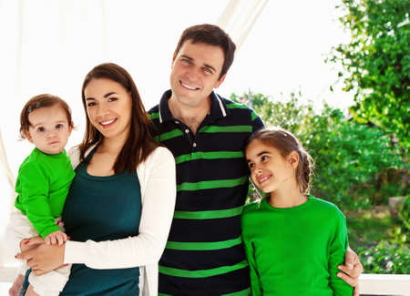 
Portrait of a happy smiling family outdoorsの写真素材