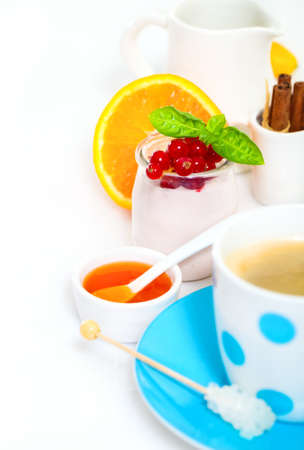 Delicious breakfast with fresh coffee, fresh waffles and fruits. Over white background の写真素材