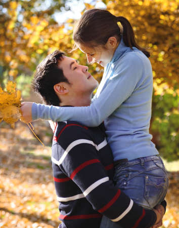 Happy young couple in love outdoorsの写真素材