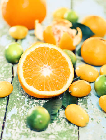 Fresh citrus fruits on the wooden rustic tableの写真素材