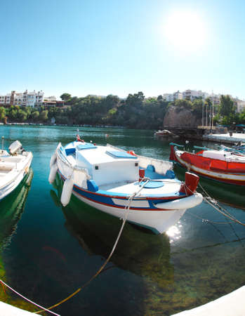 Boats at Voulismeni lake in Agios Nikolaos  Crete, Greeceの写真素材