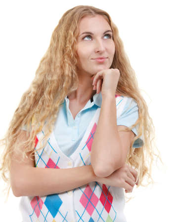 Beautiful thoughtful blond woman looking up. Isolated over whiteの写真素材