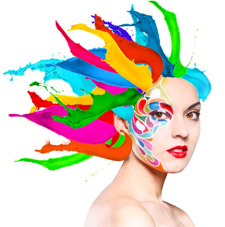 Portrait of a beautiful young model with bright make up and colored splashes isolated on white