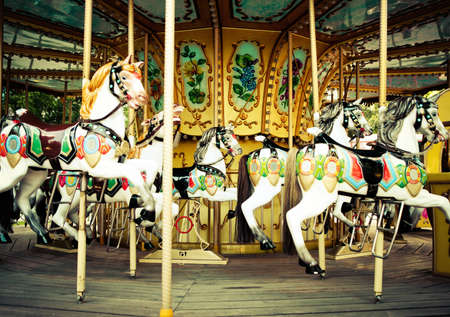 Carousel. Horses on a carnival Merry Go Roundの写真素材