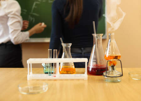 Chemistry laboratory glassware with liquid formula at the classroomの写真素材