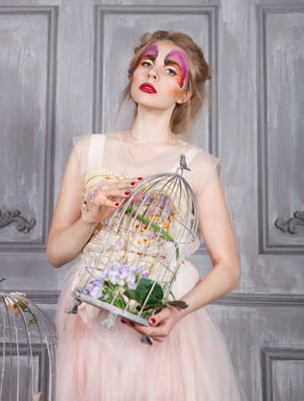 Portrait of a young model beautyful woman with perfect butterfly make up and hairstyleの写真素材