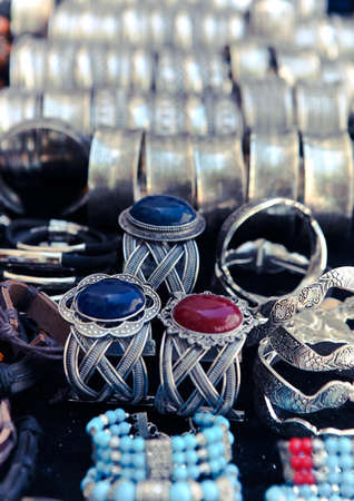 Traditional metal bracelets on the market of Tunisia. Backgroundの写真素材