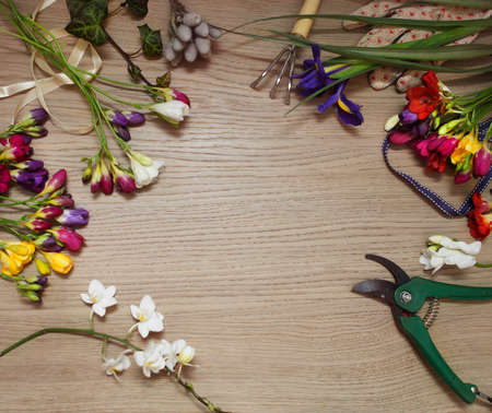 Florist workplace with copy space: flowers and accessories