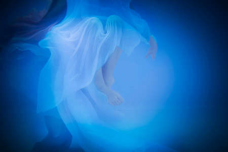 Underwater woman close up in swimming poolの写真素材