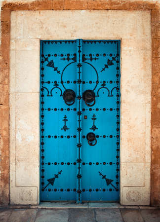 Door of Sidi Bou Said. La Gulett, Tunisia. White and blue townの写真素材